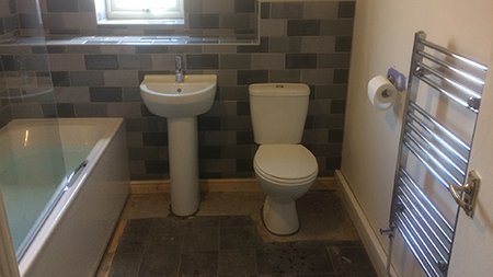 Picture of finished bathroom.